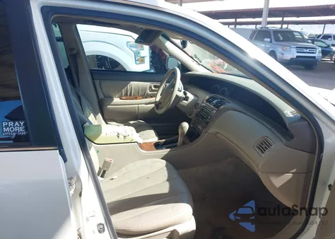 2000 Toyota Avalon Xls z USA, uszkodzony, nr VIN 4T1BF28B5YU043273